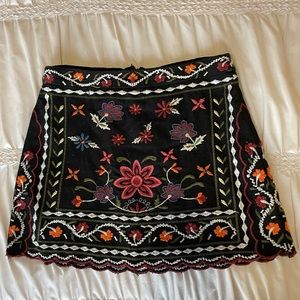 Embroidered black mini skirt